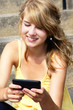 Teenager texting on mobile or cell phone