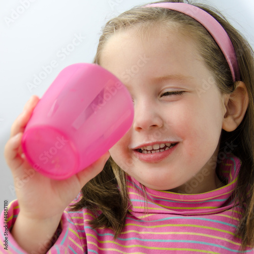 Photo: Little girl finishes her milk Little girl finishes her milk