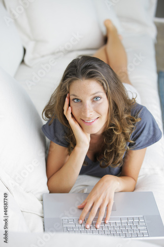 Photo: Woman using a laptop Woman using a laptop