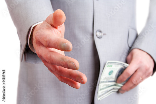 Photo: Businessman giving a hand for handshake Businessman giving a hand for handshake