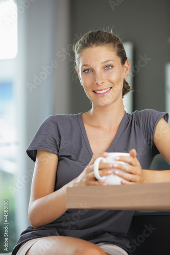 Photo: Beautiful woman with cup Beautiful woman with cup