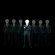 businessman with lamp-head standing against black background