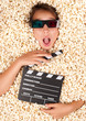 young girl buried in popcorn