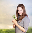 Young Woman Holding  Flowers