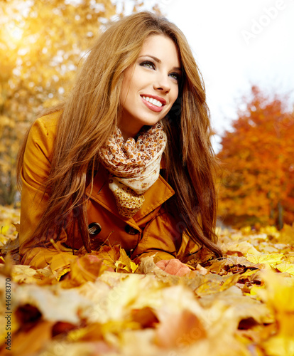 Photo: autumn woman on leafs autumn woman on leafs
