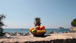 Plateful of Exotic Fruits Against Seaside