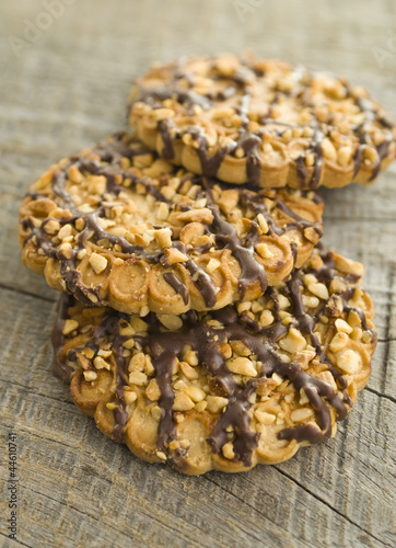 Photo: chocolate chip cookies on wooden table (selective focus) chocolate chip cookies on wooden table (selective focus)