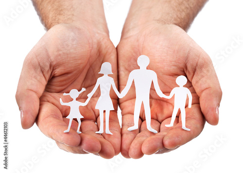 Photo: Cardboard figures of the family on a white background. Cardboard figures of the family on a white background.