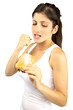 Beautiful girl trying to be on a diet fighting sweet
