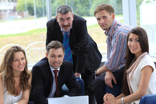 Photo: business team in business meeting business team in business meeting