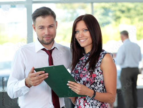 Photo: Image of two business partners planning work Image of two business partners planning work