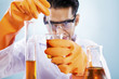 Scientist with chemicals