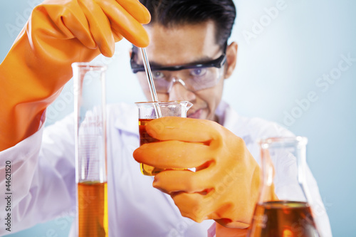 Photo: Scientist with chemicals Scientist with chemicals