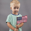 Cute Boy Holding Flag