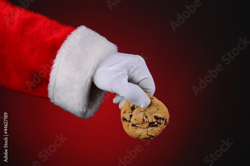 Photo: Santa Claus Holding Cookie Santa Claus Holding Cookie