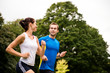 Photo: Running together - young couple jogging Running together - young couple jogging