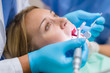 Dental check-up close-up female mouth