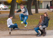 Teenage boys and girls having fun in the park
