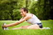Stretching exercise - sport woman outdoor