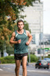 Training - man running in street