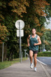 Training - man running in street