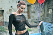 Foto: Young sexy woman with balloons Young sexy woman with balloons
