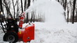 small manual machine that breaks large snow lumps