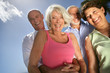 Two happy senior couples