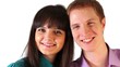 Young boy and girl huddled their heads and smile