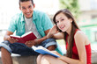Happy students with books