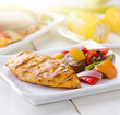 summertime barbecue chicken with vegetables.