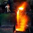 Pouring of liquid metal in open hearth workshop