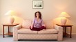 Woman sits on sofa in lotos pose, then closes her eyes