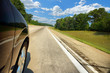 Car on the expressway on a sunny day