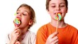 Two kids boy and girl eat lollipops isolated