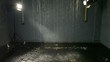 Waterfall in dark room with two spotlights on both side