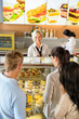 Customers waiting in line to buy dessert