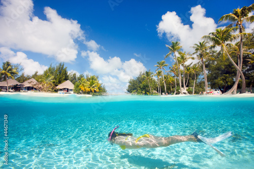 Photo: Woman swimming underwater Woman swimming underwater