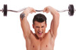 Powerful muscular man lifting weights