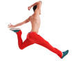 young man posing in a very high jump dance move