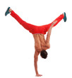 muscular dancer standing on one hand