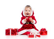Santa Claus baby girl with gift box isolated on white background