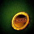 Golden Poker Chip on a green table