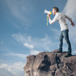 Boy screaming on the megaphone