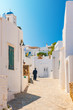 Orthodox priest in Sifnos alleyway