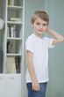 Portrait of a little boy in casuals at home