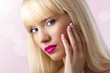 Portrait of young beautiful blonde woman with pink lips
