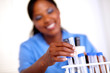 Scientific woman working with test tube