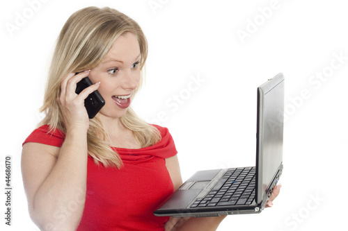 Photo: Frau mit Handy und Laptop Frau mit Handy und Laptop