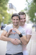 Happy gay couple outdoors